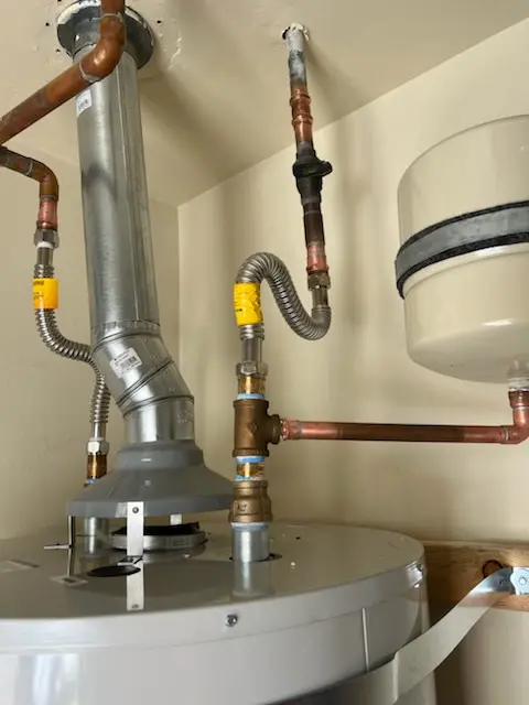 Water heater installation and plumbing repair in McDuff
